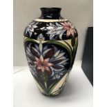 A limited edition 82/ 100 Moorcroft vase decorated