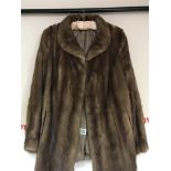 A Vintage ladies fur coat.