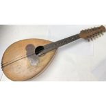 A damaged twelve stringed mandolin by Giovanni Minieri, circa 1900s.