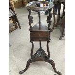 A good Georgian mahogany wash basin stand with two