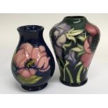 Two small Moorcroft vases decorated with flowers a