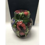 A Moorcroft ginger jar and cover decorated in the