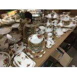 A large collection of Royal Albert country tea dinner service with meat plates tureens cups and