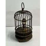 A miniature replica automaton birdcage clock.