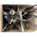 A box of mixed silver plated cutlery including some silver items.