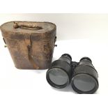 A vintage pair of cased good quality binoculars, n