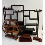 A mixed lot of Chinese hardwood display stands and