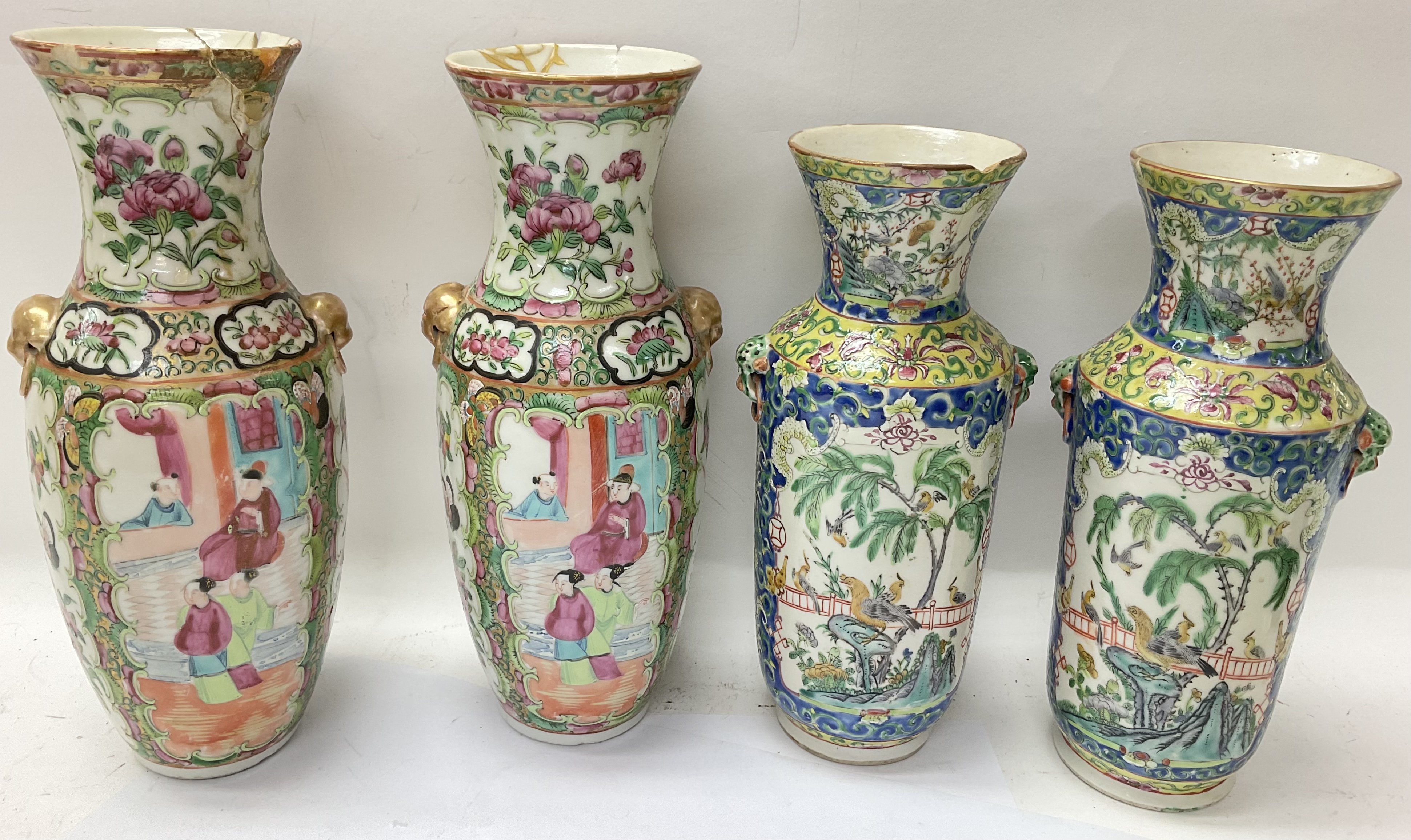 Two pairs of vases, a Cantonese pair and a famile