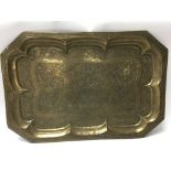 A good antique brass tray with family heraldic arm