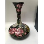 A Moorcroft vase decorated in the coronation day p