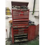 A collection of tools in a Snap-on cabinet with so