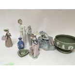 A collection of Lladro and Nao figures Wedgwood Ja