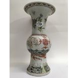 A Chinese vase decorated with birds, bats, flowers