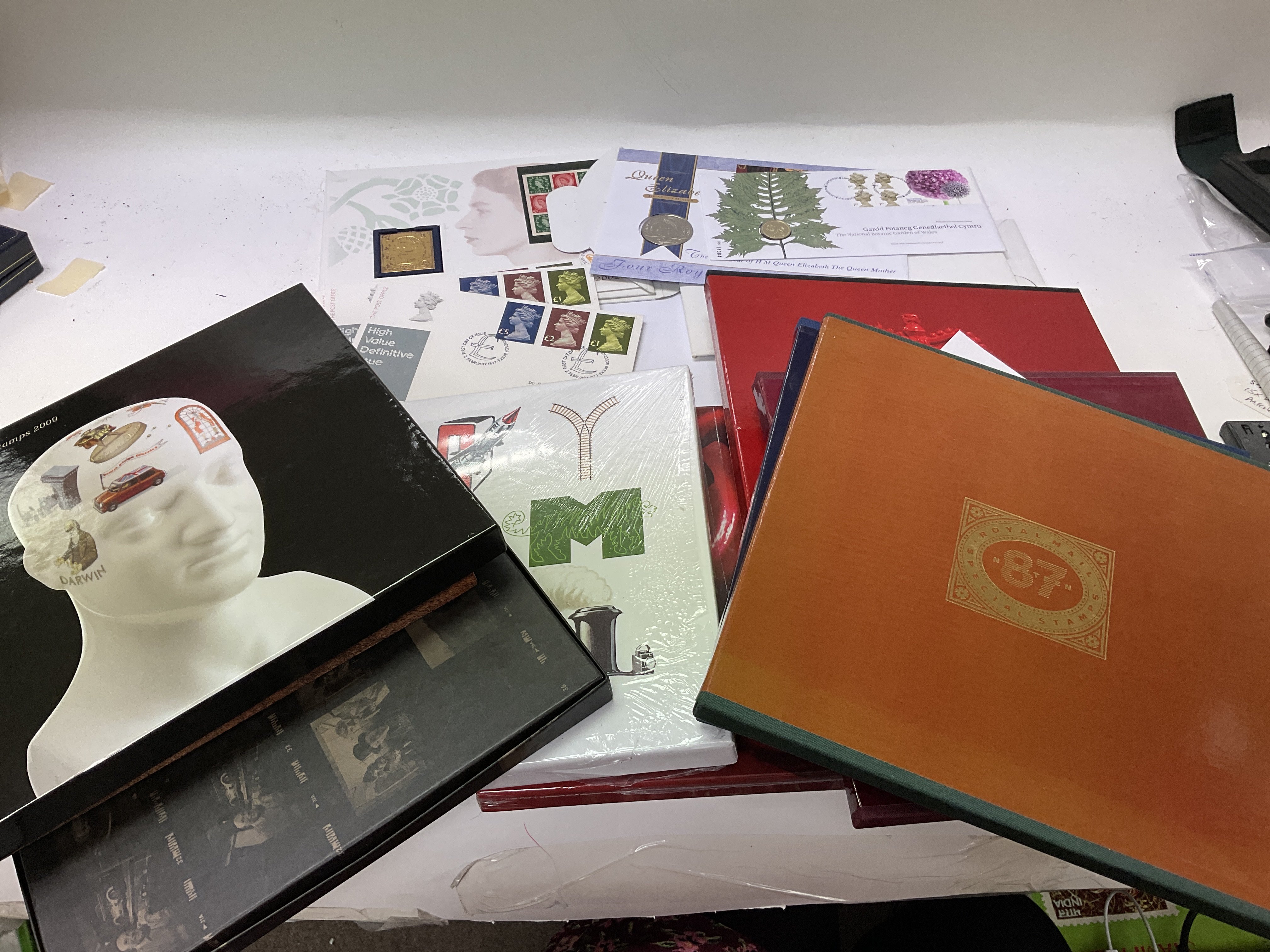 Royal Mail special stamp albums together with coin