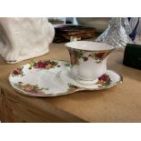 A royal Albert cup and saucer in Old Country Roses