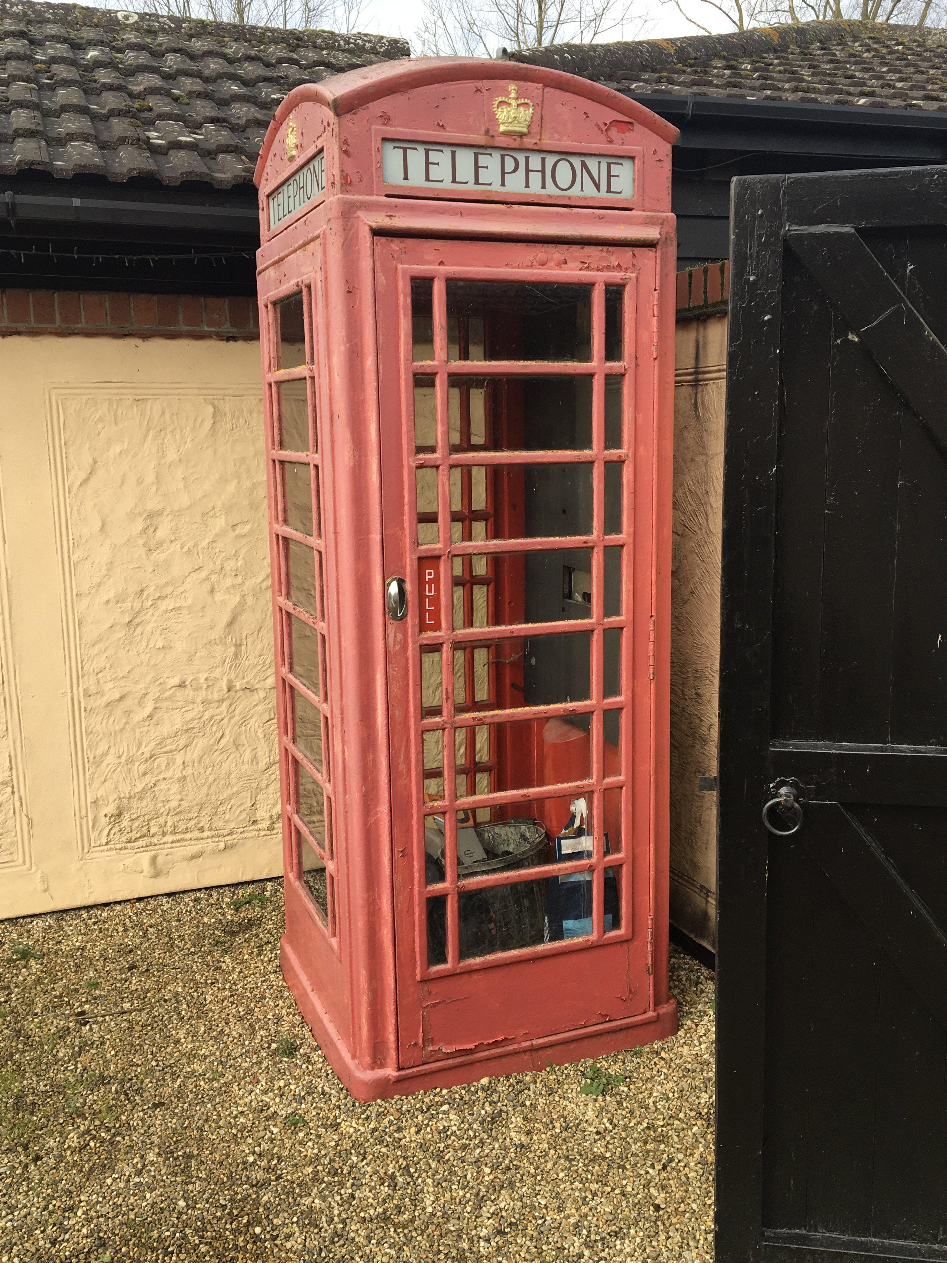 An old British red phone box. Sold in situ buyer to collect