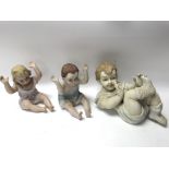 Unmarked vintage bisque trio of Piano babies - NO