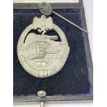 A cased 3rd Reich panzer assault badge. This is a