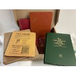 A box of stamp albums for world and commonwealth including New Zealand.