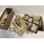 A large collection of mixed carved Ivory items in various conditions.