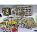 Mixed ephemera of cigarette cards and stamps.