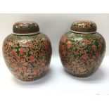 A pair of red and green Chinese ginger jars and co