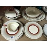 A part Susie Cooper dinner service decorated with