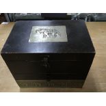 An Ebony table box with lift up lid and three draw