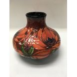 A Moorcroft vase decorated in Elizabeth Magnolia p