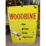 A vintage enamel sign advertising Woodbrine cigare