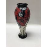 A moorcroft vase decorated in the sacred place pat