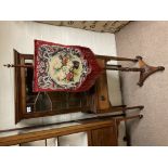 A Victorian tripod poles teen with tapestry and be