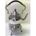 A Sheffield hallmarked silver 1926 kettle with sil
