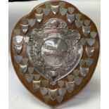 A silver plated winners shield of the Chequers tro