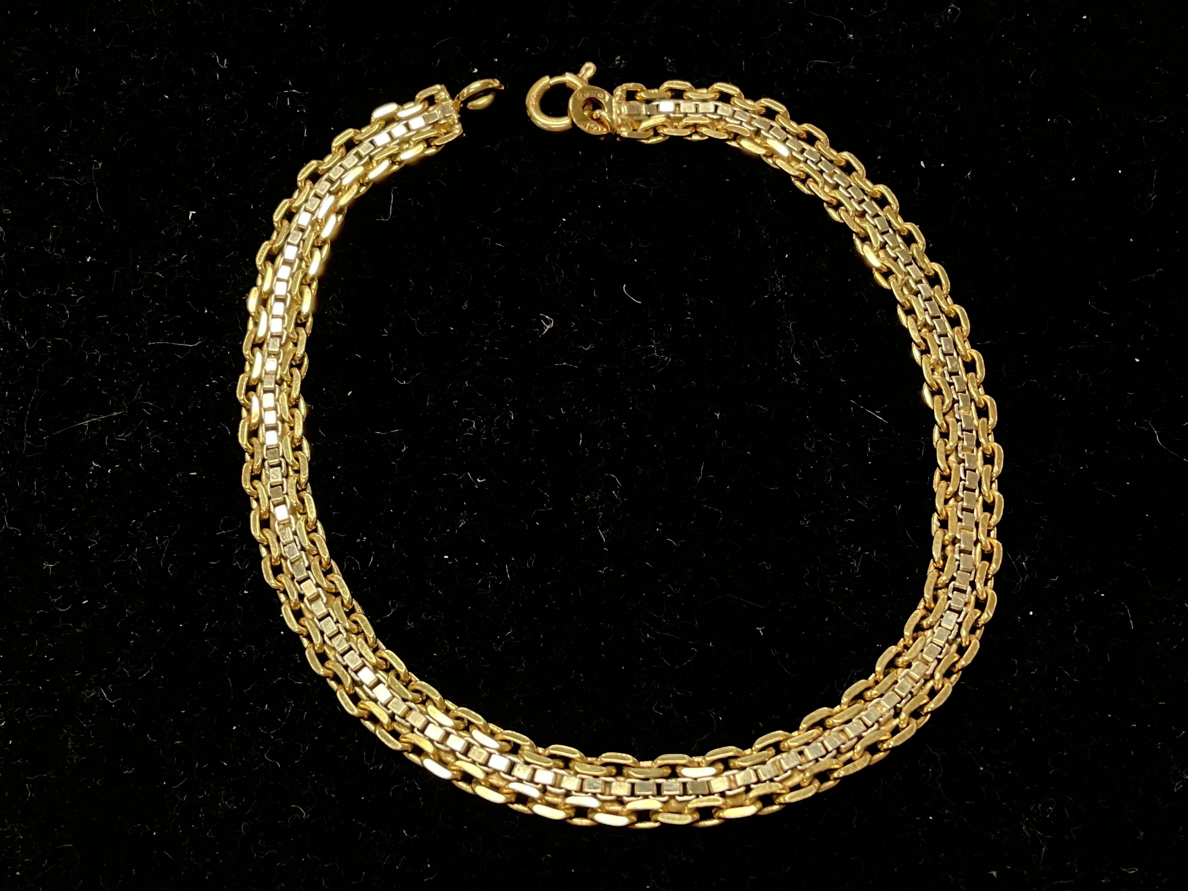 An 18ct gold link bracelet weighing approximately