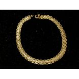 An 18ct gold link bracelet weighing approximately