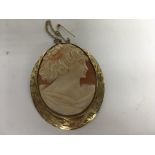 A cameo in the form of a maiden inset in a 9 ct go