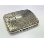 A silver cigarette case. Weighing in total approximately 60g.