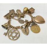 A 9ct gold charm bracelet weighing approximately 7