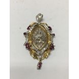 A unmarked. Victorian style pendant inset with dia