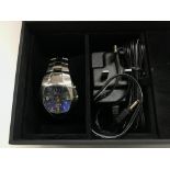 A boxed navigator watch with charger and five othe