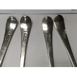 A set of four Georgian silver table spoons and thr