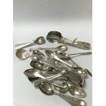 A collection of silver spoons, weighing approximat