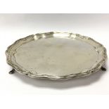 A silver hallmarked card tray weighing approximate