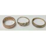 Three 9ct gold rings, weighing approximately in to