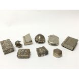 A collection of small novelty silver trinket boxes