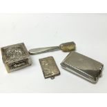 A collection of silver items including a brush, tr