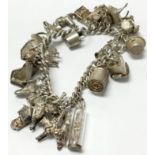 A silver charm bracelet weighing approximately 96g
