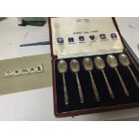 A cased set of silver spoons made by Mappin & Webb