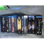 Two bags of blu rays comprising various films and TV series including the original Star Trek series,